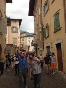 Class wandering the streets in Arco, Italy.
