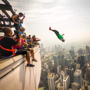 Chuma jumping from the KL tower in Malaysia. photo by Ian Flanders.